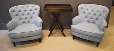Lot 554 - A pair of modern button back armchairs...