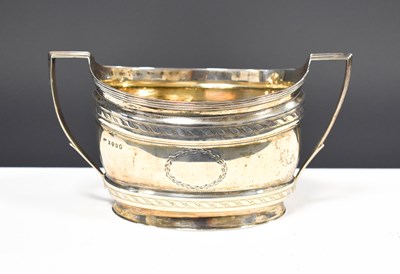 Lot 113 - A Georgian silver slop bucket, of oval form,...