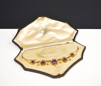 Lot 117 - A 19th century 9ct gold, amethyst, peridot and...