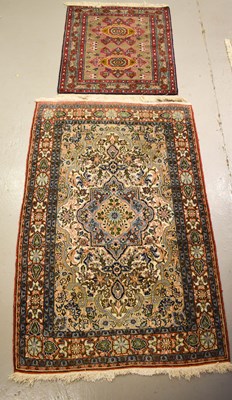 Lot 486 - Two Middle eastern rugs the smaller having a...