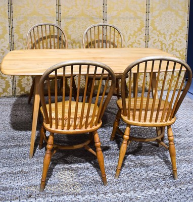 Lot 468 - An Ercol Dining table, H70 by L150 by W76cm,...