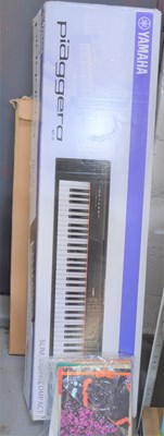 Lot 506 - A Yamaha Piaggero digital keyboard with stand,...