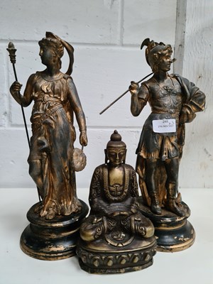 Lot 248 - A pair of antique metal figurines in the form...