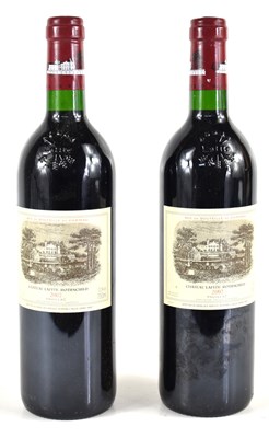 Lot 52 - Two bottles of 2002 Chateau Lafite Rothschild,...