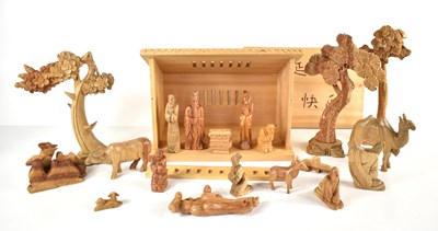 Lot 254 - A Chinese carved wooden nativity set to...