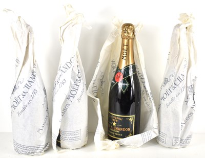 Lot 66 - Four bottles of Moet & Chandon dry imperial...