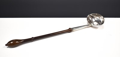 Lot 8 - A Georgian silver and fruitwood wine ladle...