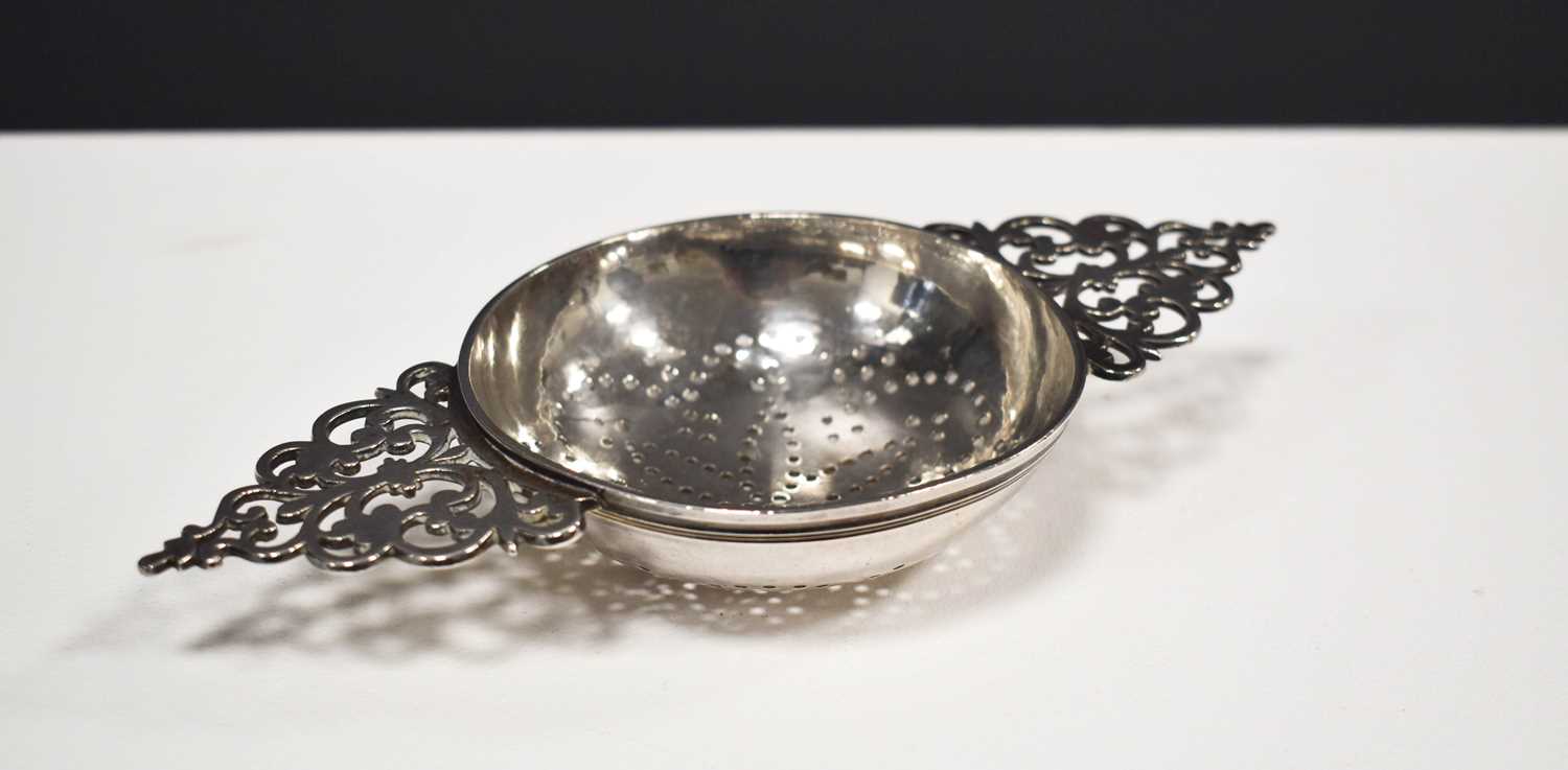 Lot 12 - A silver wine filter, likely by William Denny,...