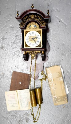Lot 153 - A mahogany and brass lantern wall clock, with...