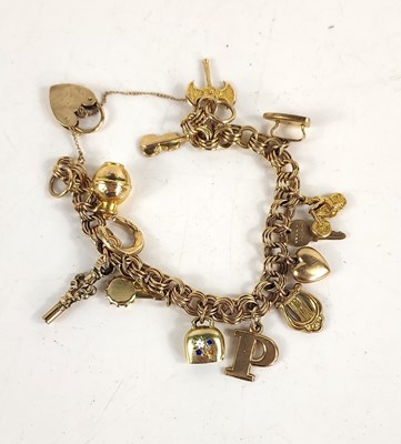 Lot 99 - A 9ct gold charm bracelet, with a heart form...