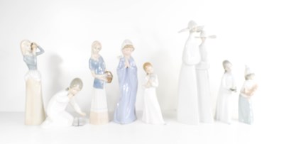 Lot 230 - A selection of four Lladro porcelain figurines,...