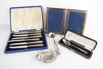 Lot 109 - A silver spoon, boxed, a silver dish in the...