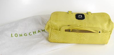 Lot 194 - A Longchamp pale green crocodile skin pattern...