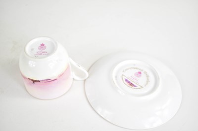 Lot 216 - A Royal Worcester coffee cup and saucer by...