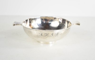 Lot 175 - A silver plated quaich cup, bearing initials R...