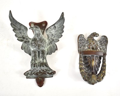 Lot 259 - Two 19th century bronze door knockers in the...