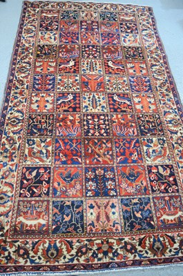 Lot 487 - An Iranian Bakhtiar large wool rug with a...