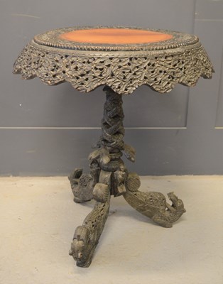 Lot 573 - A 19th century Anglo-Indian carved table with...