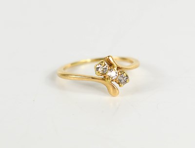 Lot 140 - A gold and diamond ring, the three old cut...