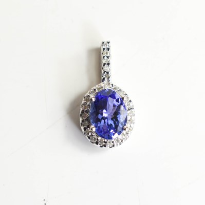 Lot 126 - An 18ct white gold, oval cut amethyst and...