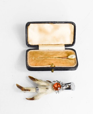 Lot 232 - A gold and pearl pin, in the original box,...