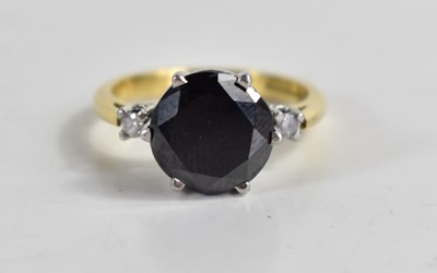 Lot 251 - An 18ct gold ring set with a brilliant cut...