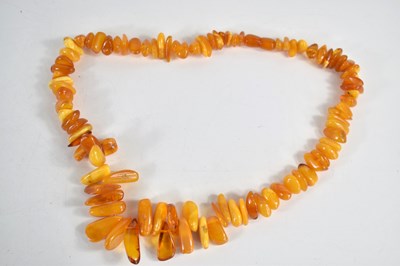 Lot 144 - A vintage clear and butterscotch polished...
