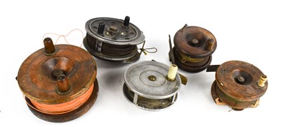 Lot 398 - Three wooden antique fishing reels, together...