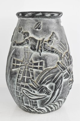 Lot 205 - A large pottery vase, depicting donkey bucking...