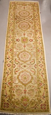 Lot 472 - A cream ground wool runner