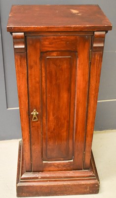 Lot 566 - A Victorian mahogany cabinet with cushion...