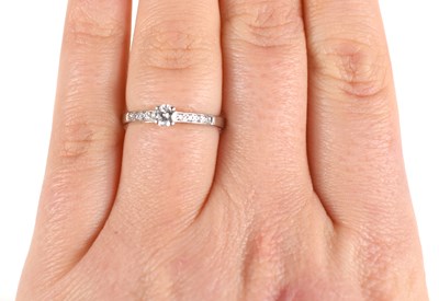 Lot 248 - An 18ct white gold solitaire-style diamond...