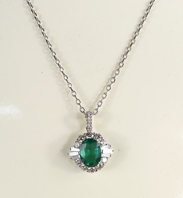 Lot 280 - An 18ct white gold pendant set with oval-cut...