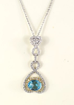 Lot 272 - Aan 18ct white gold heart pendant set with an...