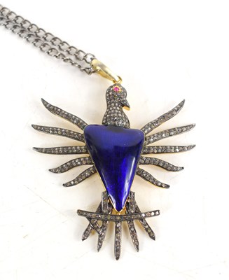 Lot 261 - A large bird pendant set with ruby eye and...