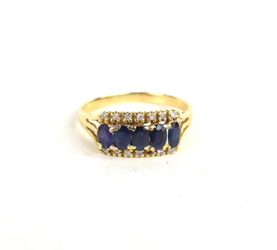 Lot 186 - A 14ct gold, sapphire and diamond ring, the...