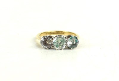 Lot 137 - A 9ct gold and paste set three stone ring,...