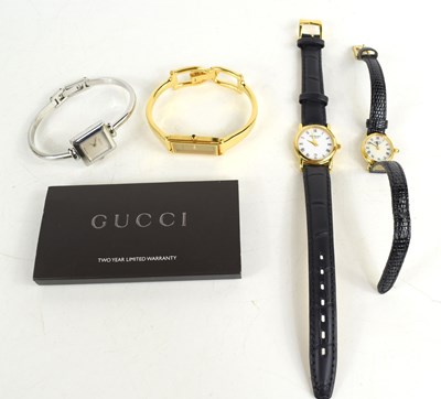 Lot 285 - Two Gucci wristwatches, a Raymond Weil example...