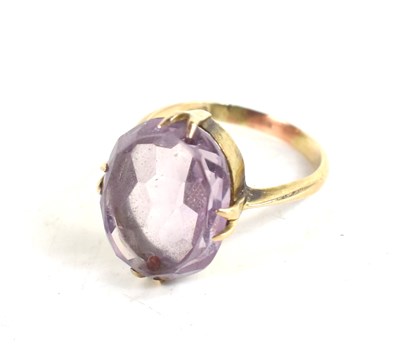Lot 16 - A 9ct gold and amethyst dress ring, the oval...