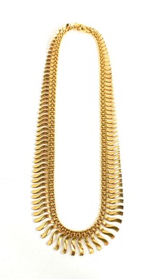 Lot 32 - An 18ct gold necklace, composed of graduated...