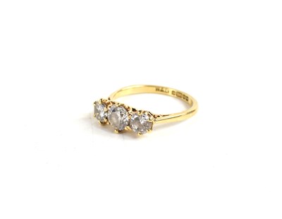 Lot 35 - A 9ct gold and three stone paste ring, size N,...
