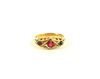 Lot 180 - A 9ct gold and ruby ring, the three rubies...