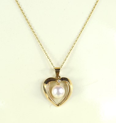 Lot 73 - A 9ct gold pendant necklace, the heart shaped...
