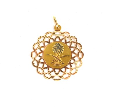 Lot 219 - An 18ct gold Middle-Eastern pendant, with...