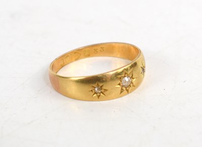 Lot 178 - An 18ct gold and three stone diamond gypsy...