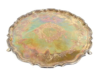 Lot 351 - An Edwardian silver salver, engraved with...