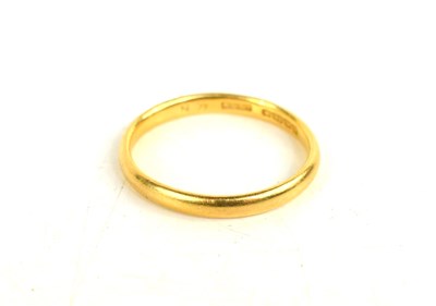 Lot 193 - A 22ct gold wedding band, size M, 2.9g.