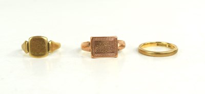Lot 194 - Three 9ct gold rings, to include a rose gold...