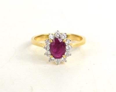 Lot 160 - An 18ct gold, ruby and diamond flower head...