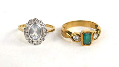 Lot 162 - A 9ct gold, blue topaz and diamond ring, size...